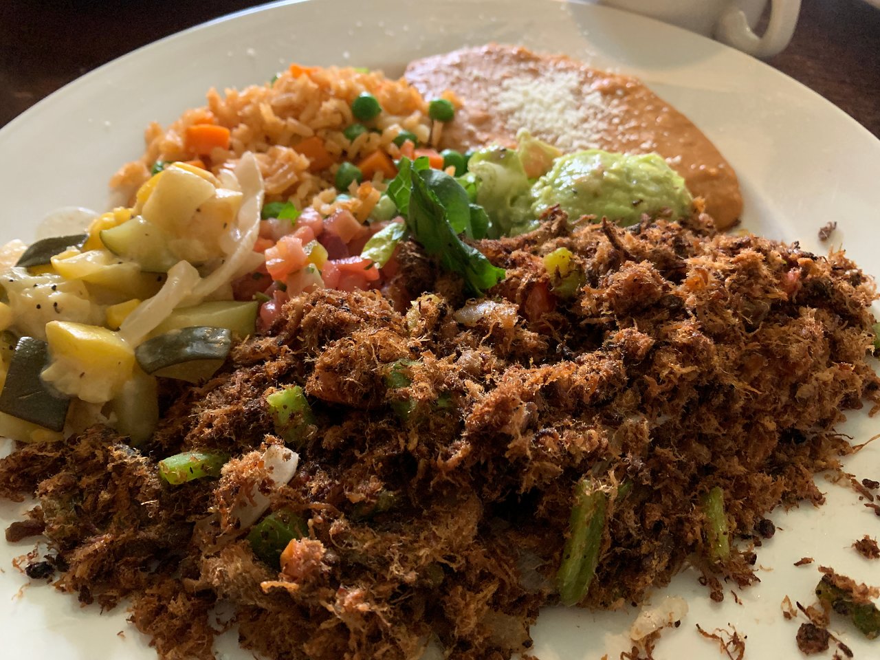 El Charro Café signature dishes The Carne Seca PlatterTamale Temptation TrioOriginal Enchis- Pollo ArizonaTucson's Enchiladas Sonorenses
